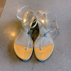 Michael Kors leather metallic sandals.